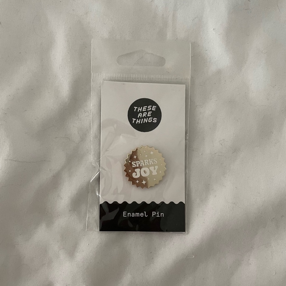 “sparks joy” enamel pin - NWT